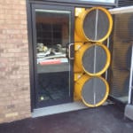 Air leakage testing equipment in sealed off doorway